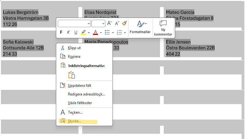 Justera styckeinställningar för adressetiketter i Word
